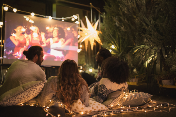 Outdoor movie theater for graduation celebration