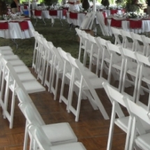White folding chair rentals for Wisconsin wedding reception.