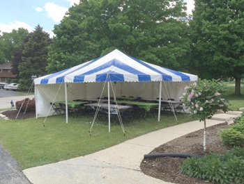 Blue and white striped event tent