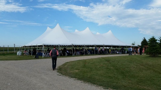 White pole tent wedding reception